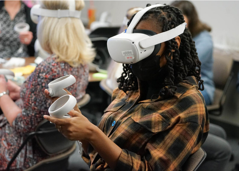 a student wears a virtual reality headset