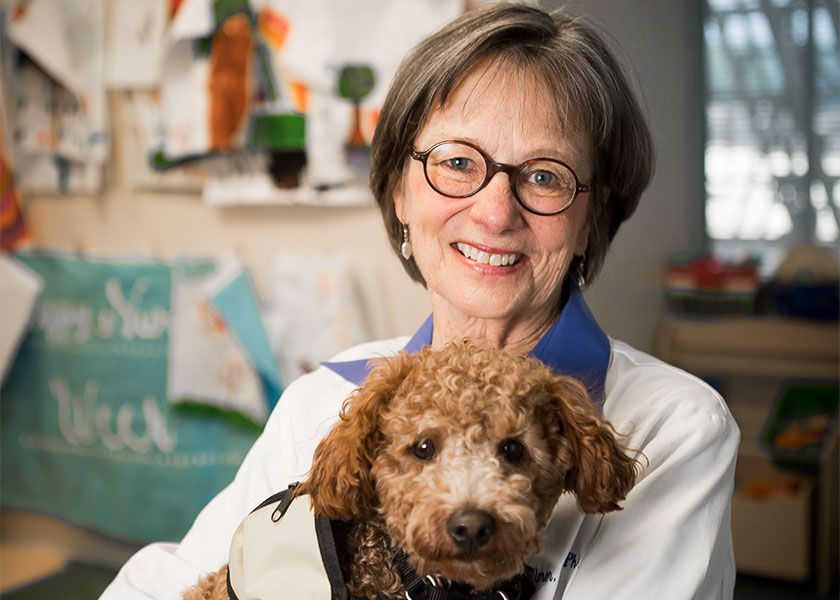 Mary Jo Gilmer with therapy dog Annabelle