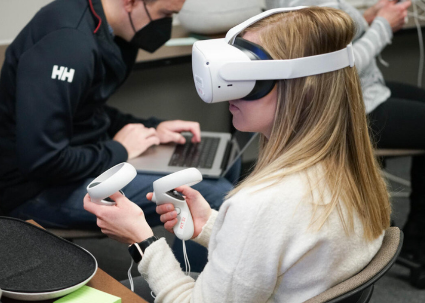 a student wears a virtual reality headset