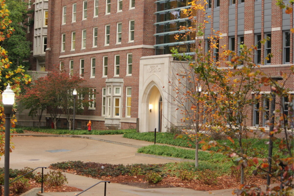 outside of nursing building, brick with fall leaves