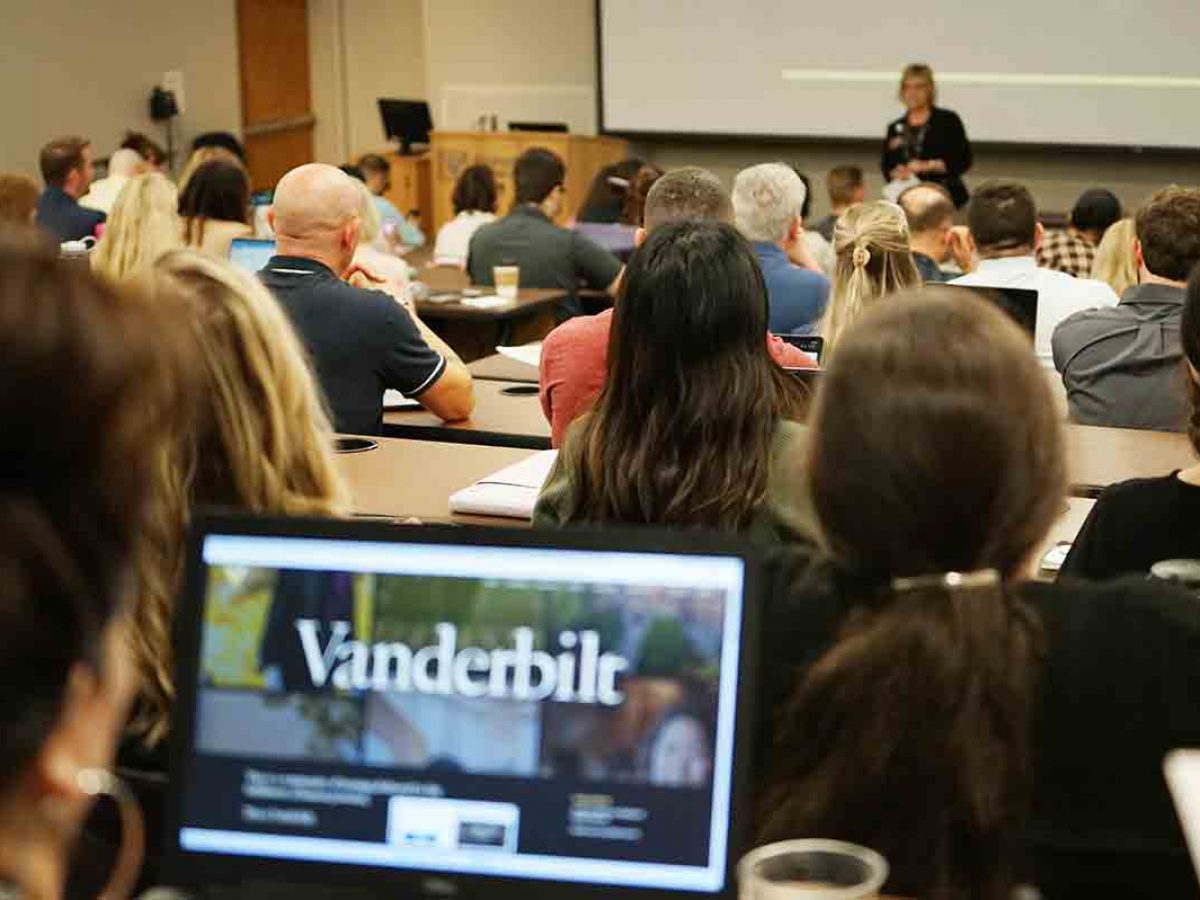 Nursing Students watching an instructor in a classroom