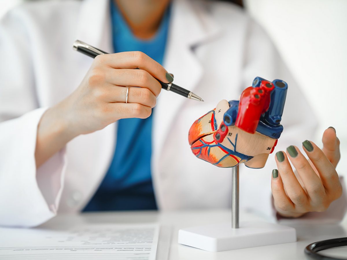 nurse examining patient's arm